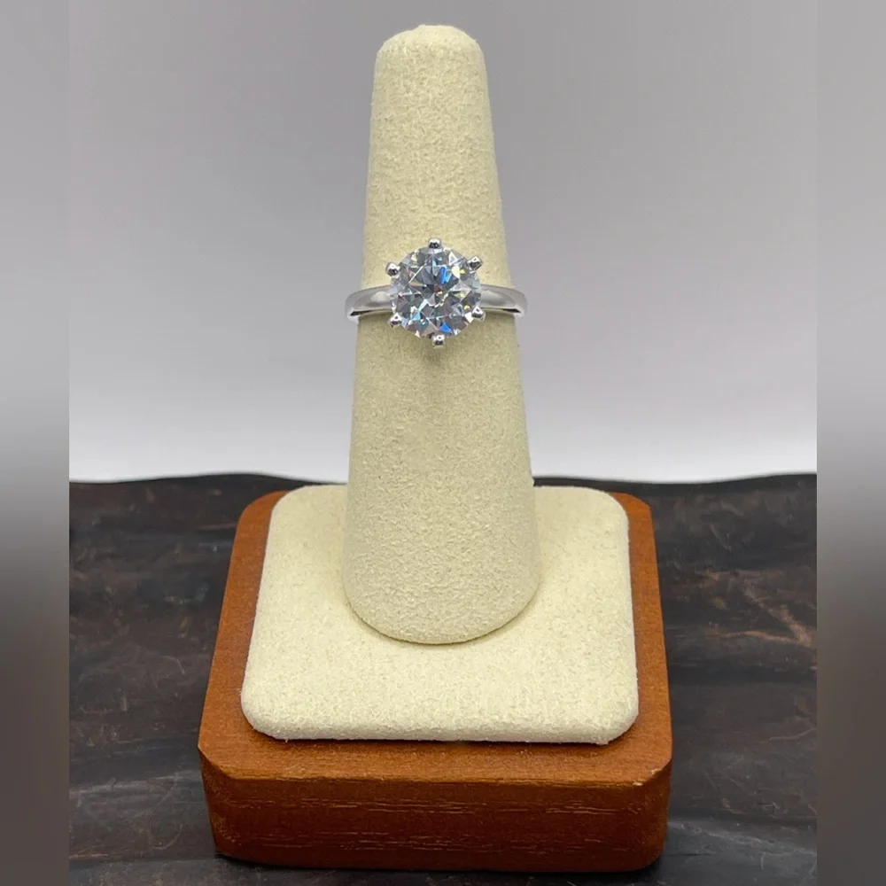 Two (2) carat cz solitaire in a 925 sterling silver setting. Size 6.25.